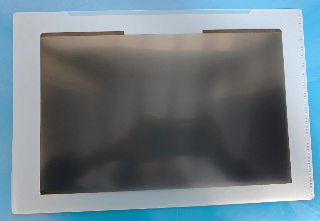 Privacy filter sample stored in a protective folder for buyer review before a bulk order.