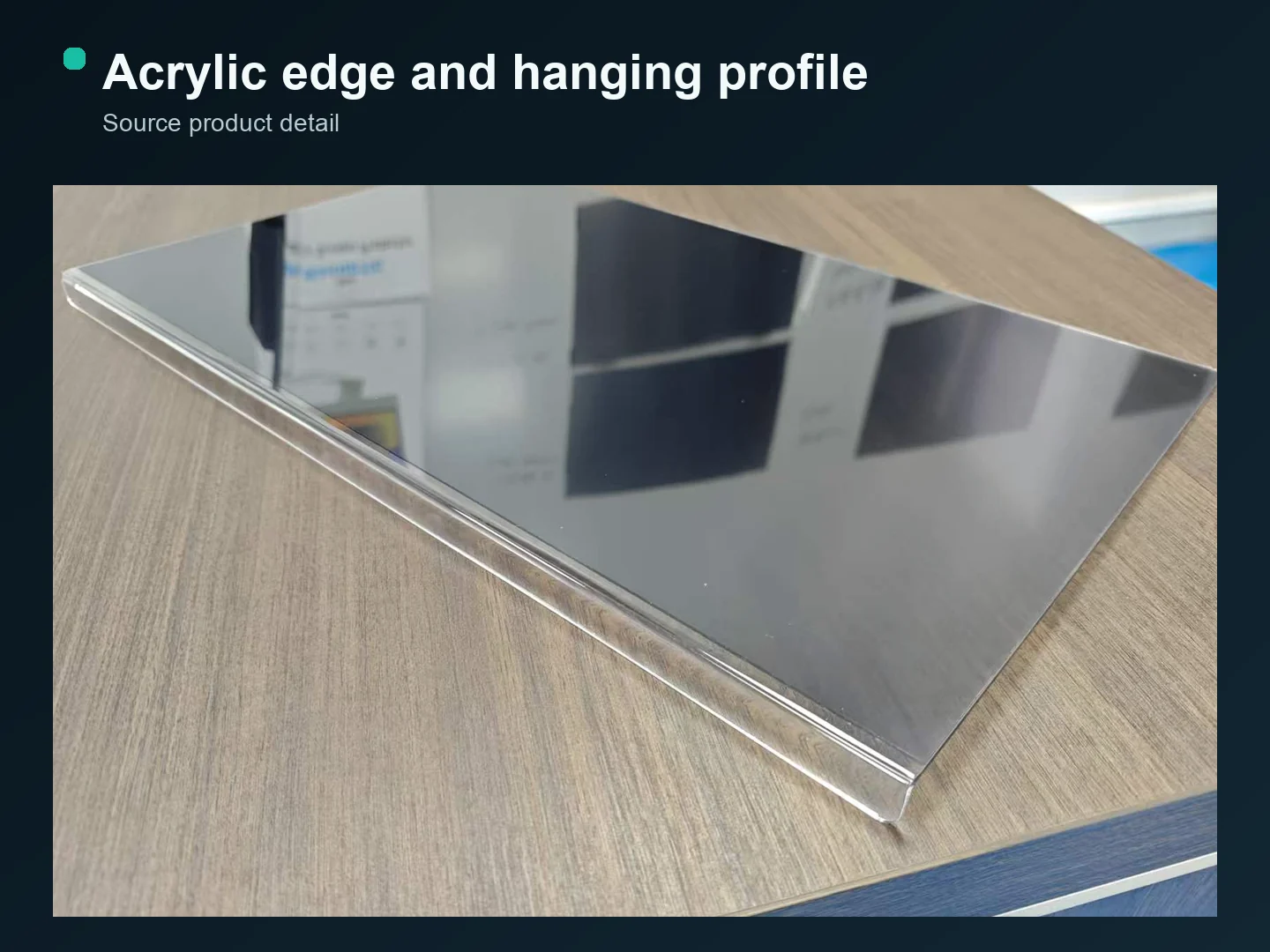 Acrylic privacy panel laid flat with its transparent hanging edge visible