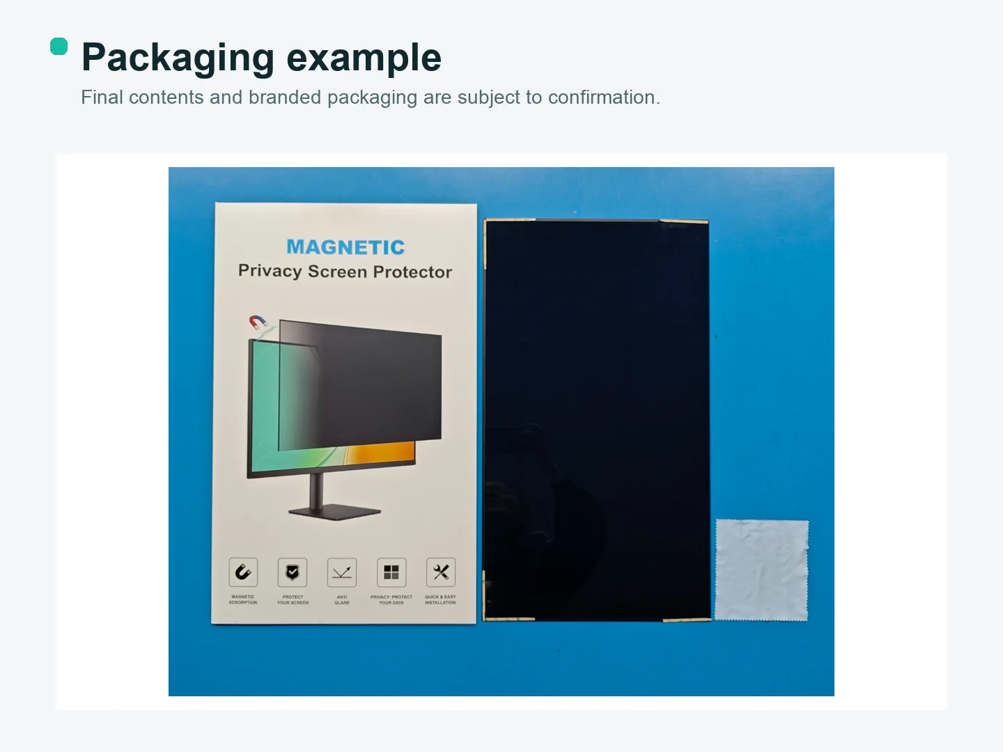 Magnetic monitor privacy screen packaging box next to the cut filter and a cleaning cloth.