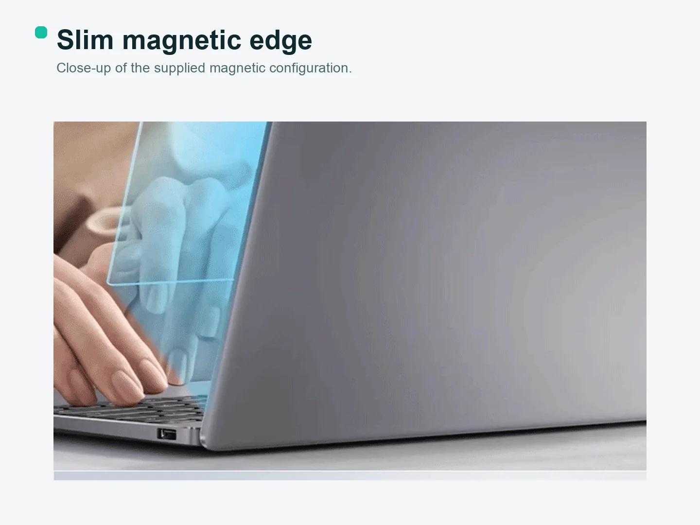 Close-up of a magnetic privacy screen edge fitted to a Surface laptop