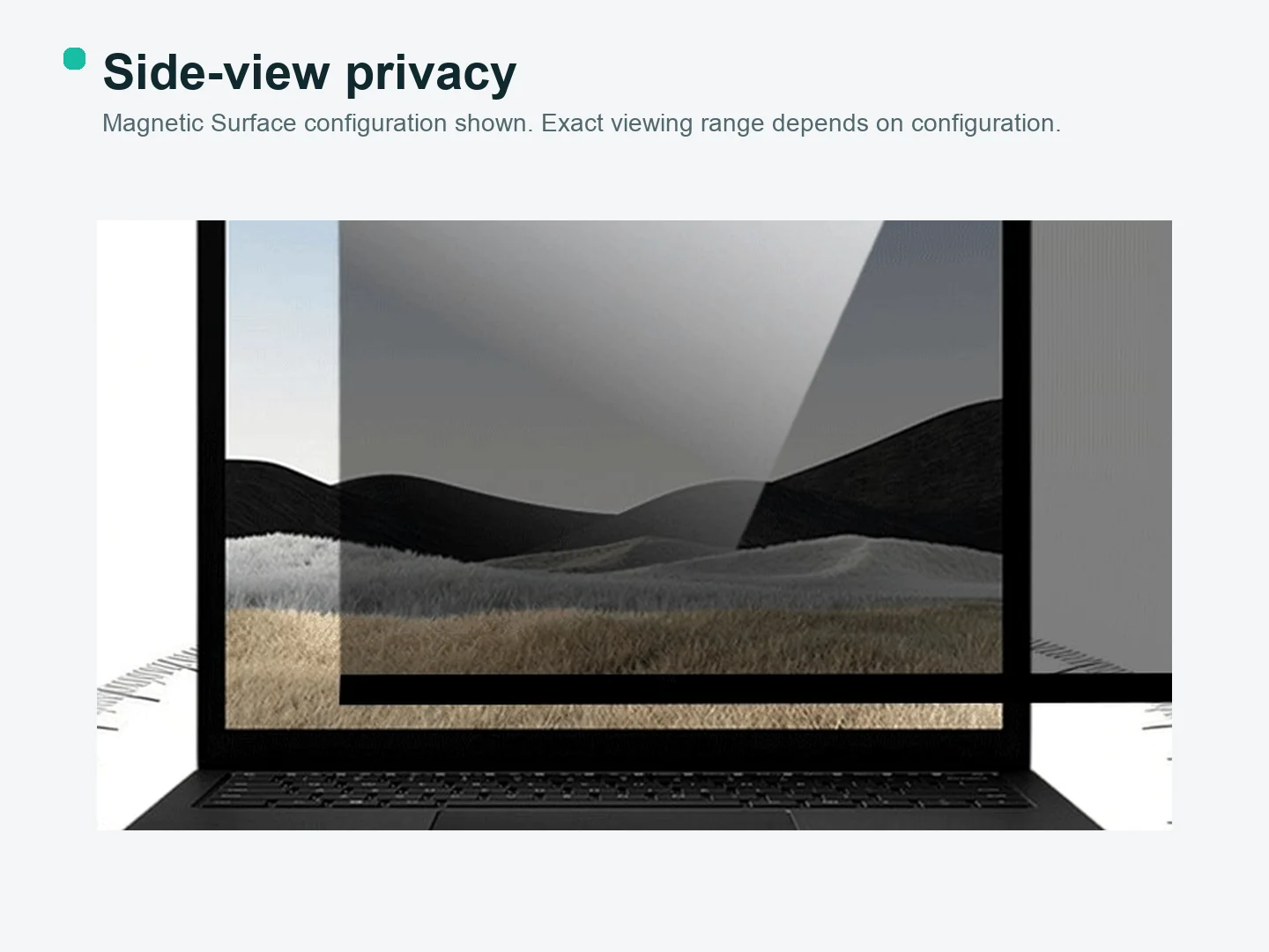 Side-angle view of a laptop display showing darkened side viewing angles with a magnetic privacy filter installed.